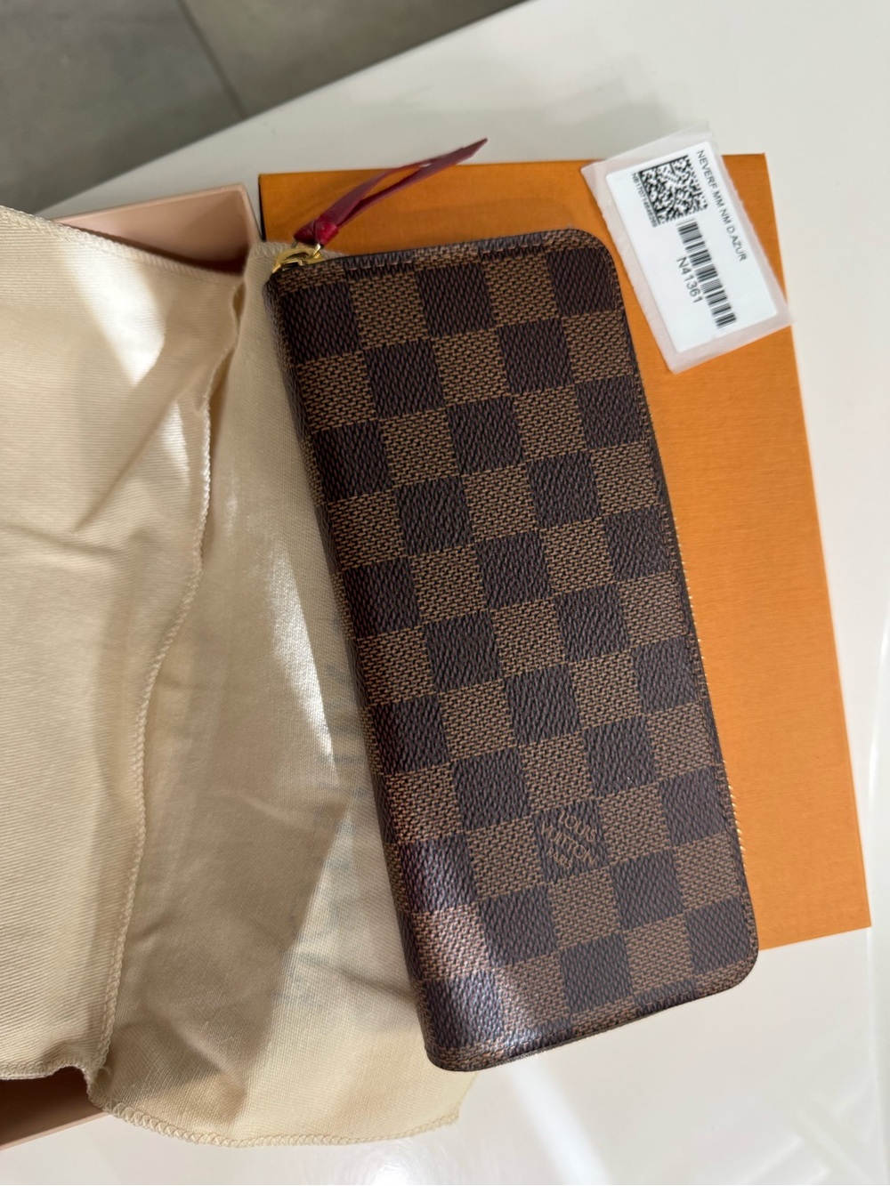 Louis Vuitton Damier Ebene Wallet.